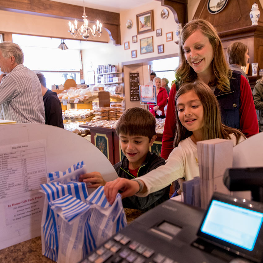 image of children at the check out of a candy store